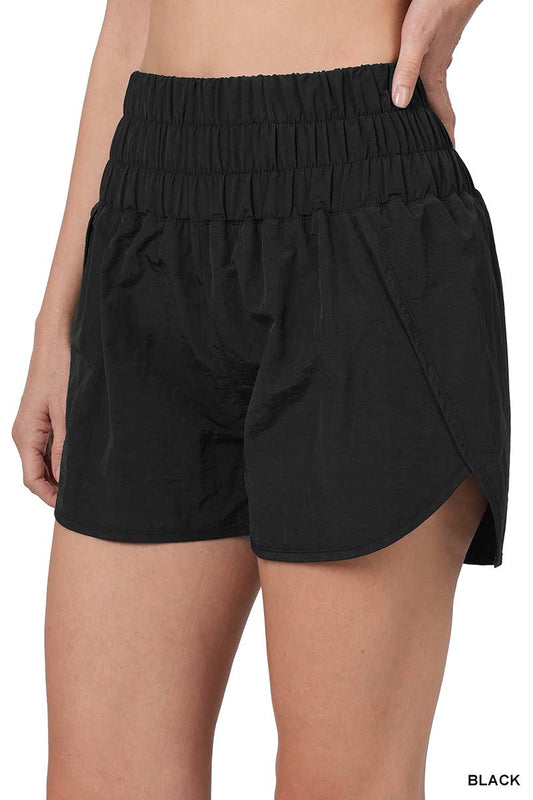Track shorts w/ back pocket & brief lining