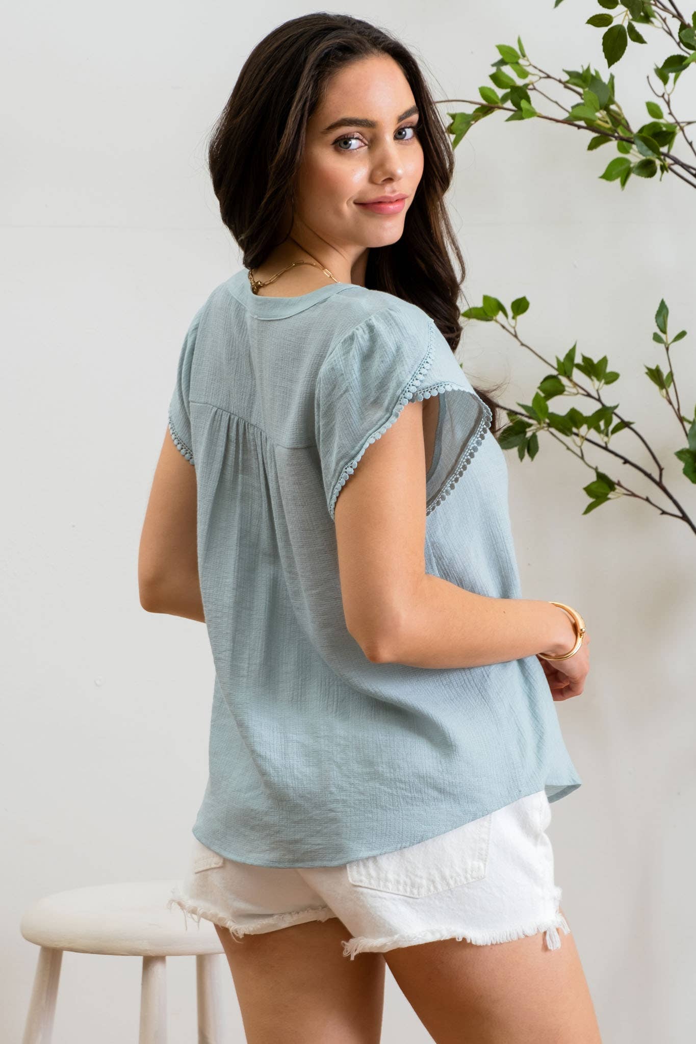 PETAL TASSEL SLEEVE BLOUSE