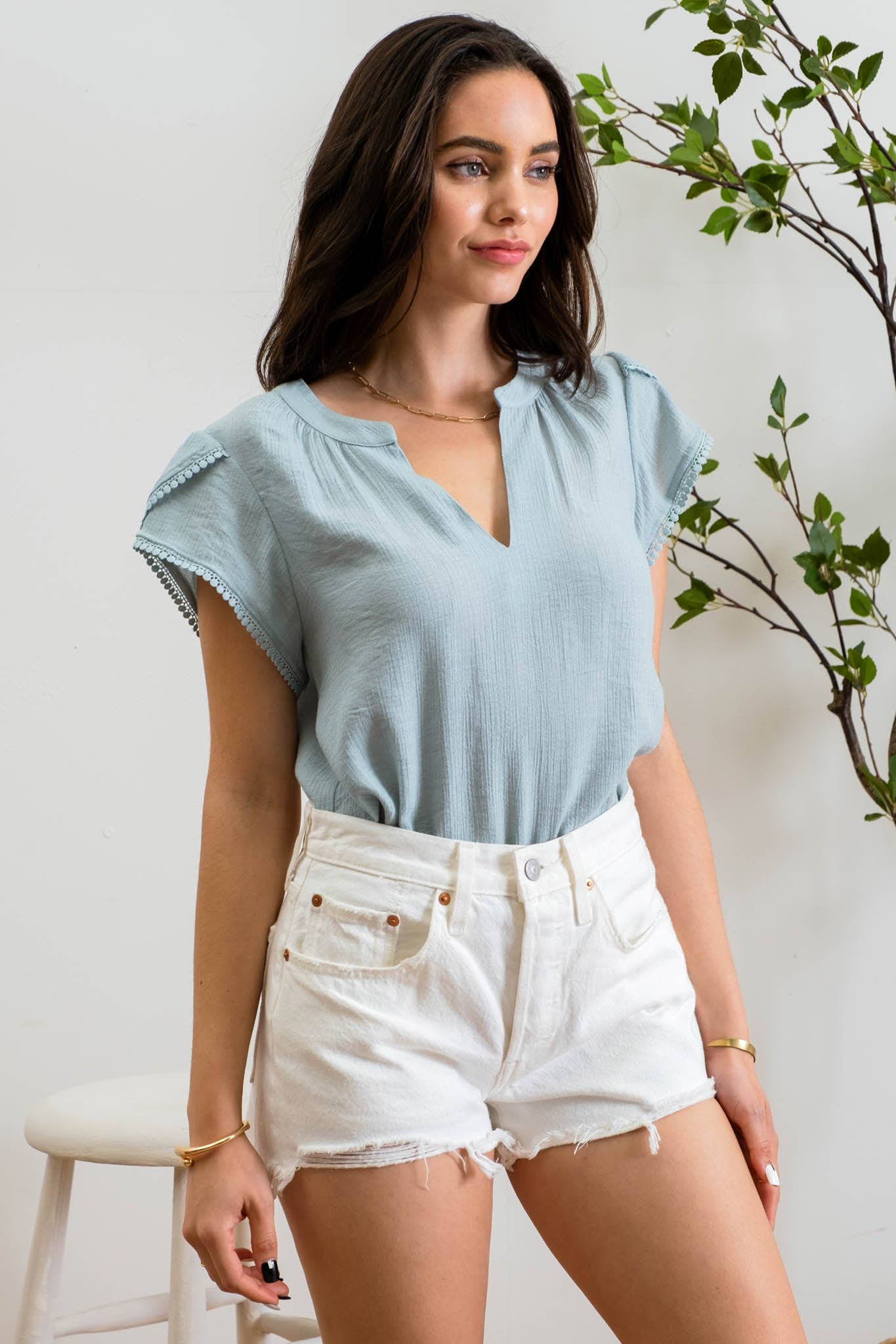 PETAL TASSEL SLEEVE BLOUSE