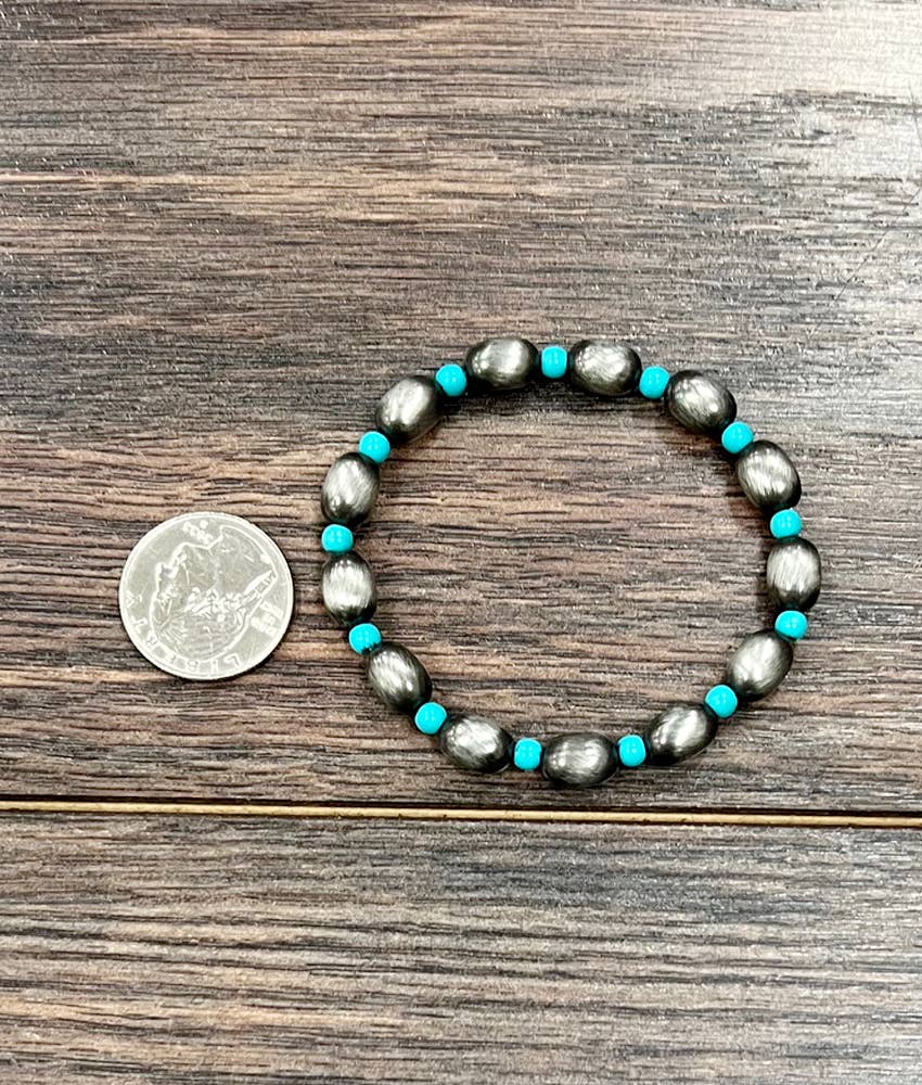 711600, 10mm Oval Navajo Bead Stretch Bracelet