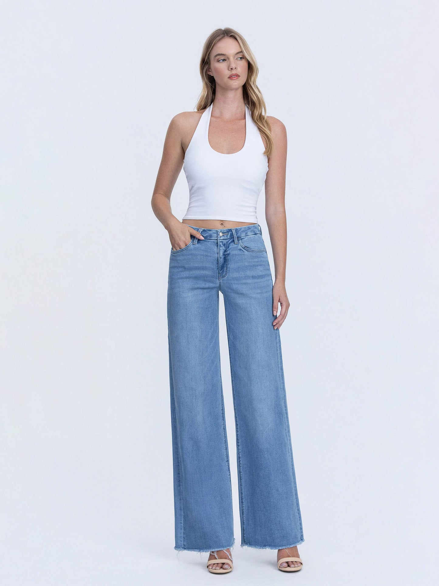 VERVET HIGH RISE MEDIUM WASH FRAYED HEM WIDE LEG JEANS