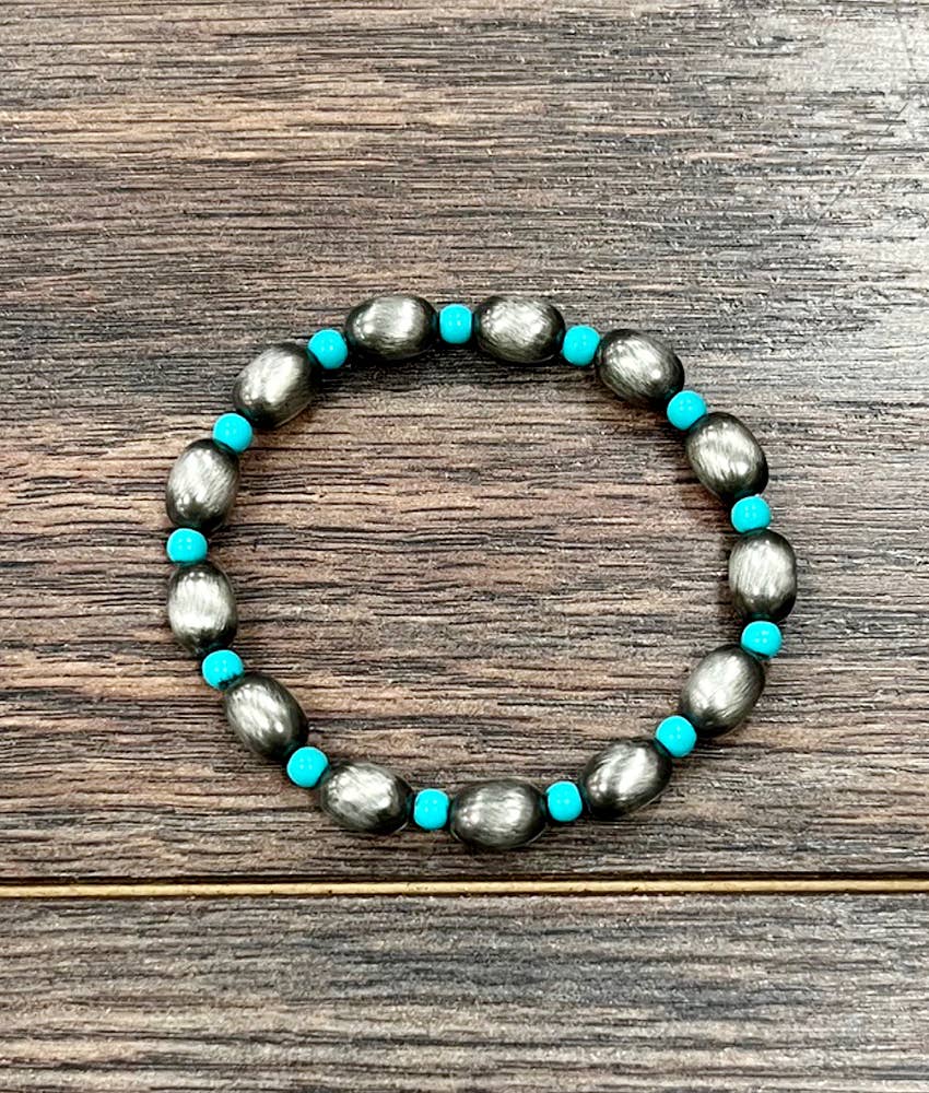 711600, 10mm Oval Navajo Bead Stretch Bracelet