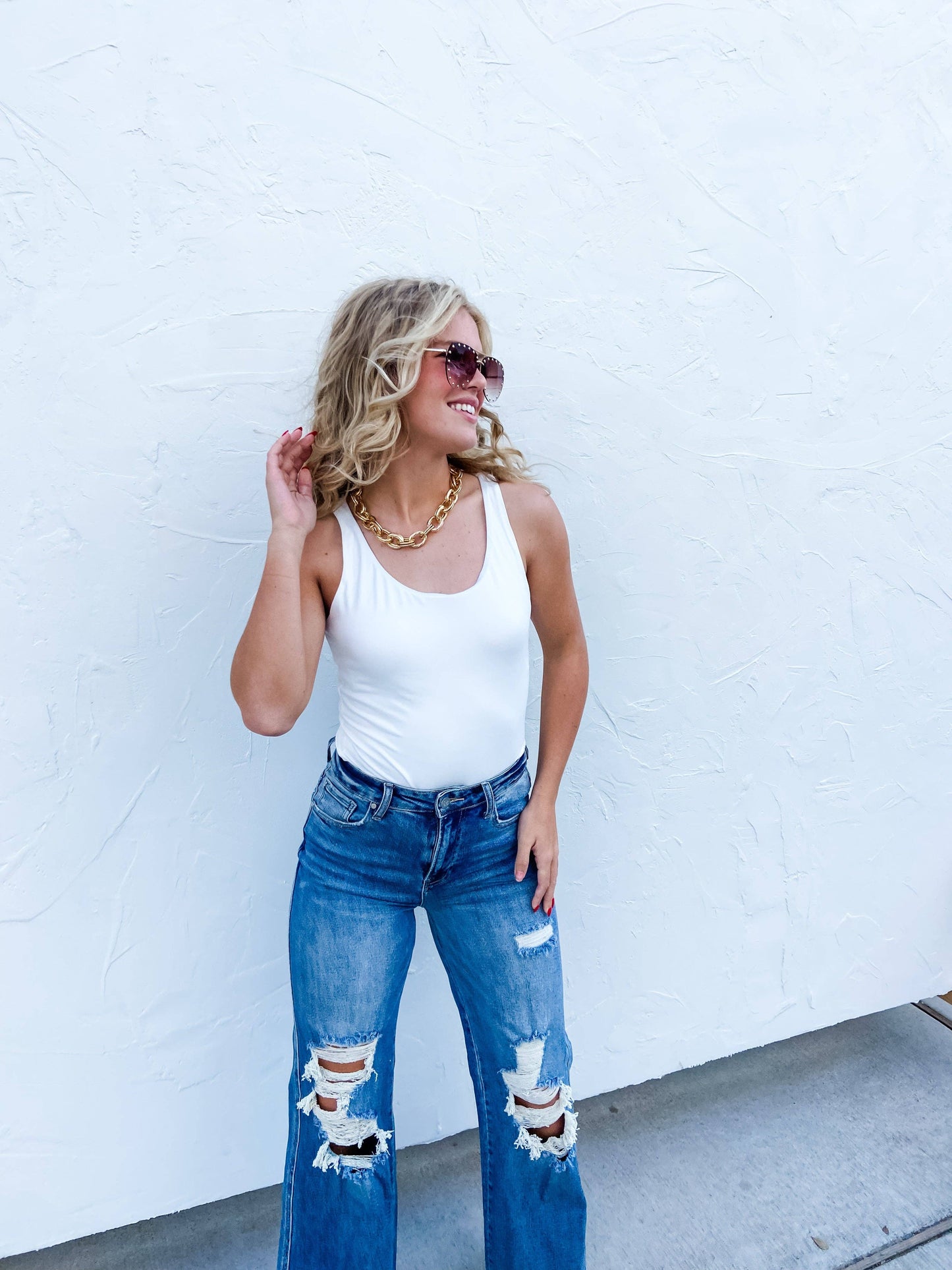 BLAKELEY MEDIUM WASH DISTRESSED JEANS